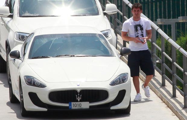 Messi with his cars