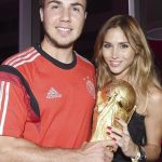Gotze nad Ann with FIFA World Cup trophy