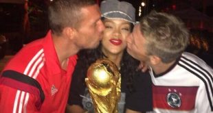 Rihanna holding World Cup trophy with Gotze & Podolski