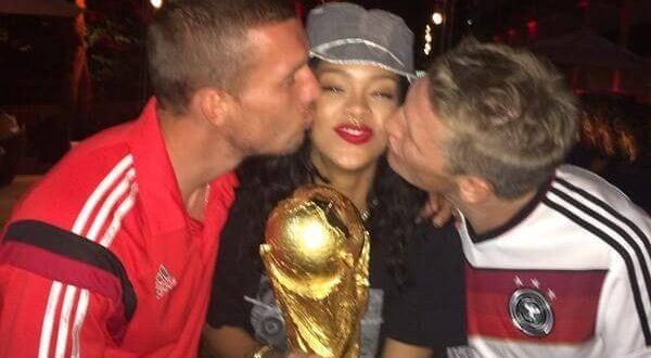 Rihanna holding World Cup trophy with Gotze & Podolski