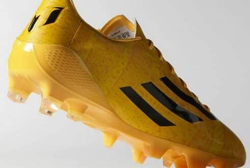 Rear-front view of new golden cleats of Messi