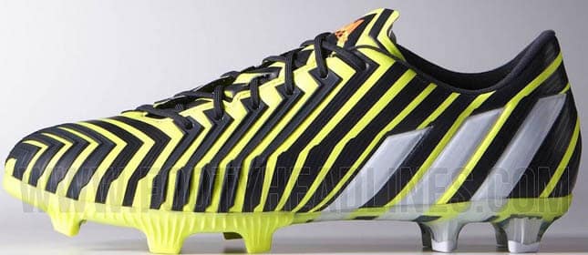 black and yellow adidas football boots