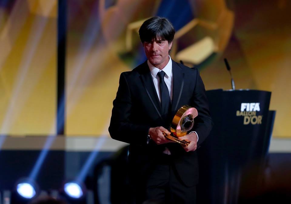 Joachim Low with coach of the year trophy