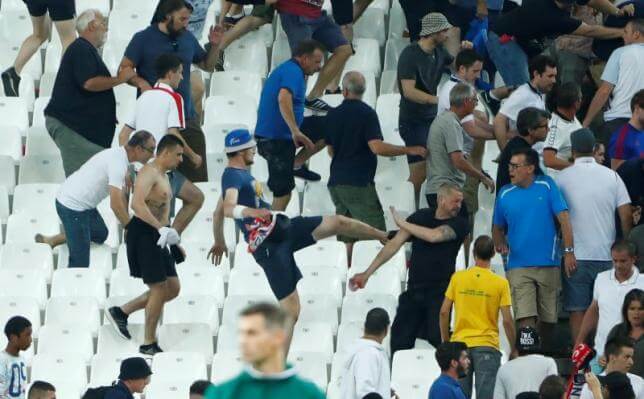 Russian fans showing violent behavior at the end of the match