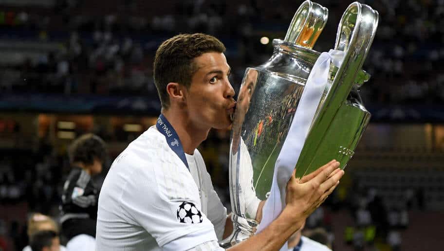 MILAN, ITALY - MAY 28: Cristiano Ronaldo of Real Madrid kisses the trophy after winning the UEFA Champions League Final match between Real Madrid and Club Atletico de Madrid at Stadio Giuseppe Meazza on May 28, 2016 in Milan, Italy. (Photo by Matthias Hangst/Getty Images)